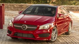 2015 Mercedes CLA250 in red on cobblestone road